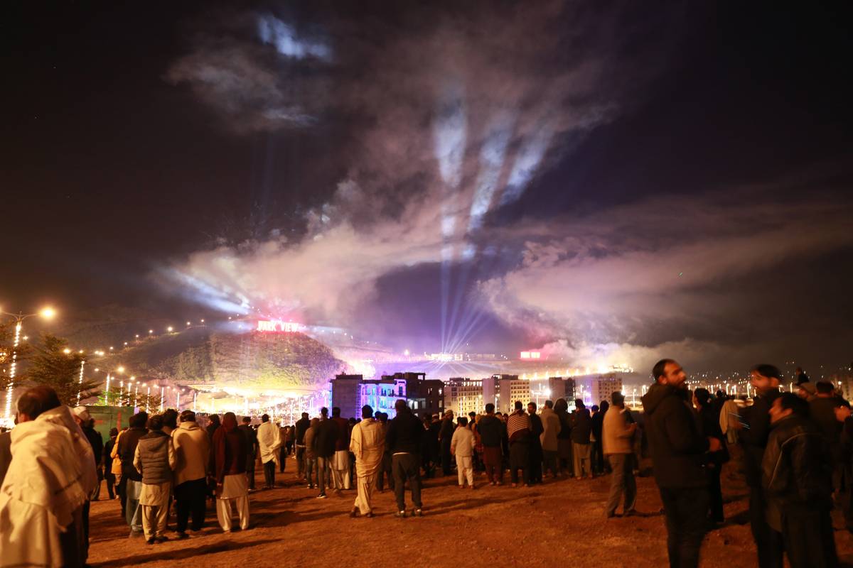 Fireworks explode during the celebrations of new year in Islamabad, Pakistan, on January 01, 2023. [Photo by Muhammad Reza/Anadolu Agency via Getty Images]