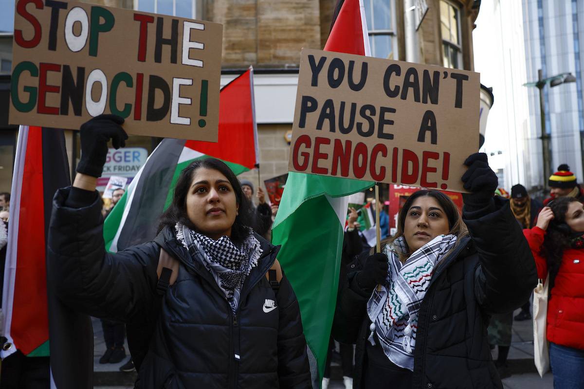 Protesters participate in a Pro-Palestinian rally during a day of action on November 25, 2023 in Glasgow, Scotland. [Jeff J Mitchell/Getty Images]