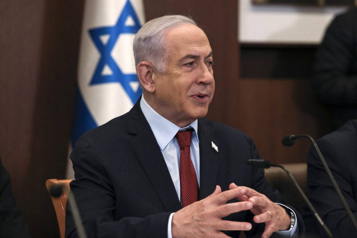 Israeli Prime Minister Benjamin Netanyahu heads the weekly cabinet meeting at his office in Jerusalem on December 10, 2023 [RONEN ZVULUN/POOL/AFP via Getty Images]