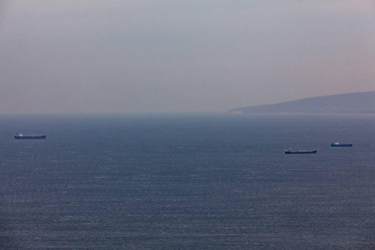 Commercial vessels are sailing in the Mediterranean Sea off the coast of northern Israel on December 21, 2023, following the United States' announcement of its intention to establish a multinational coalition to protect cargo ships traveling through the Red Sea from attacks by Yemen's Iran-backed Houthi group. [Mati Milstein/NurPhoto via Getty Images]