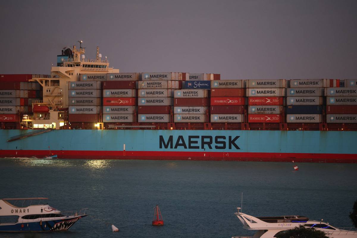 The Maersk Sentosa container ship sails southbound to exit the Suez Canal in Suez, Egypt, on Thursday, Dec. 21, 2023. [Photo by Stringer/Bloomberg via Getty Images]