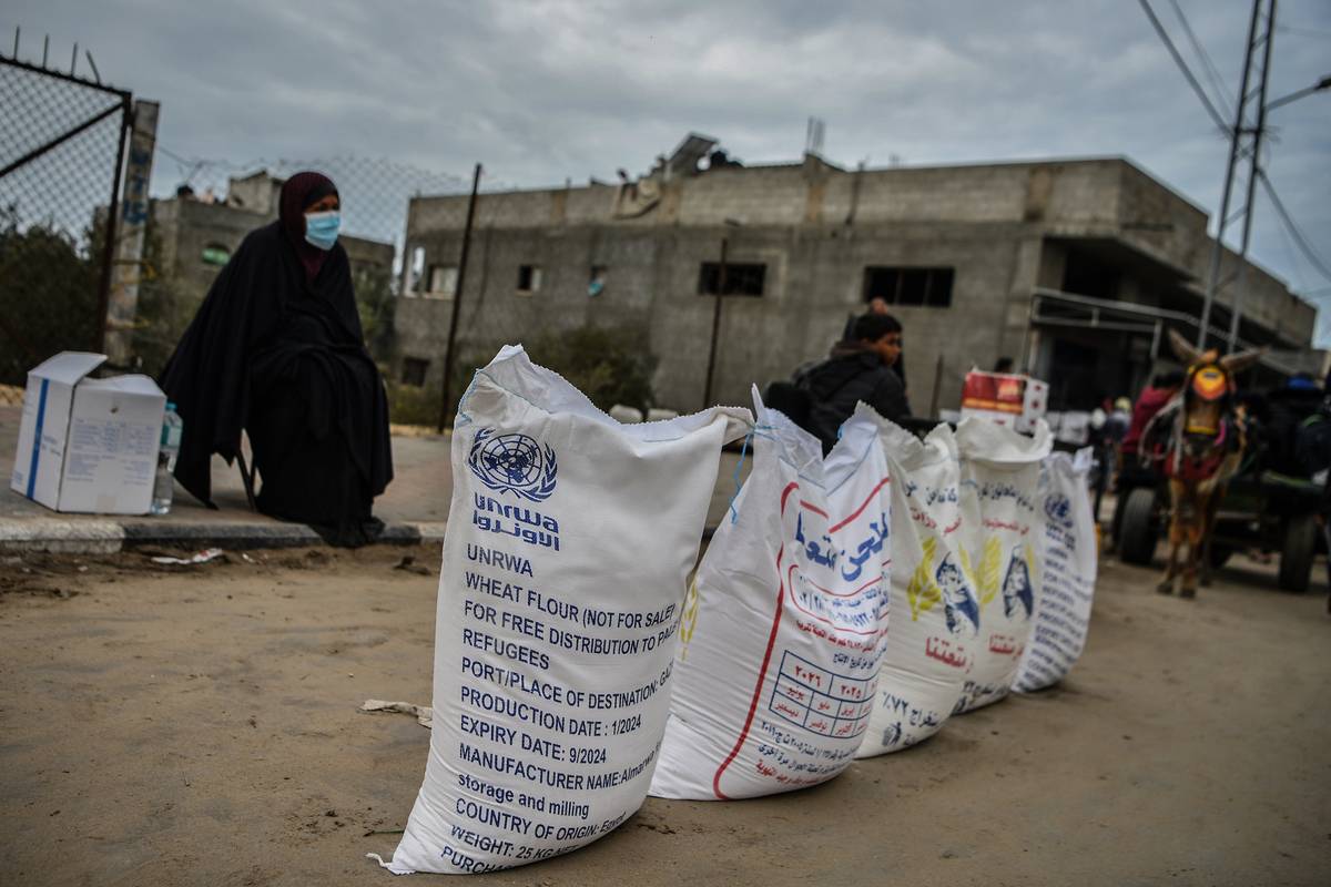 Bags of flour are seen at the area where UNRWA (The United Nations Relief and Works Agency for Palestine Refugees) distributes flour to families as Israeli attacks continue in Rafah of Gaza on January 28, 2024. [Abed Zagout - Anadolu Agency]