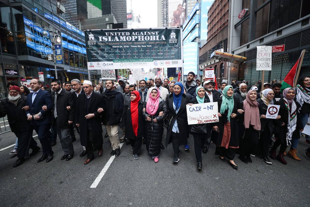 Demonstrators march with banners during a protest against Islamophobia following the attacks at Christchurch in New Zealand on March 24, 2019 in New York, United States. [Atilgan Ozdil/Anadolu Agency/Getty Images]