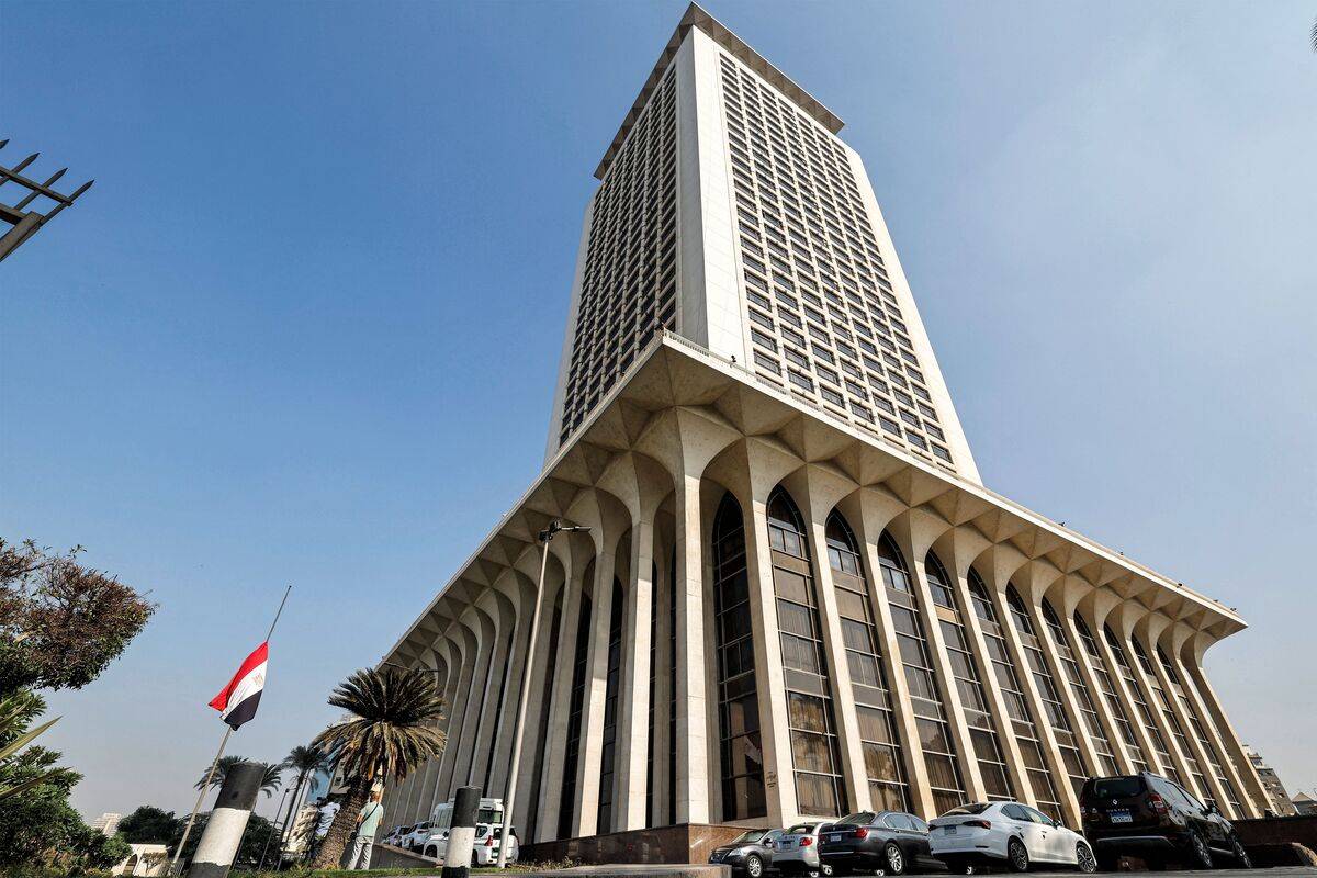 Egypt's flag flies at half-mast outside the foreign ministry headquarters in Cairo on October 19, 2023. [Photo by KHALED DESOUKI/AFP via Getty Images]