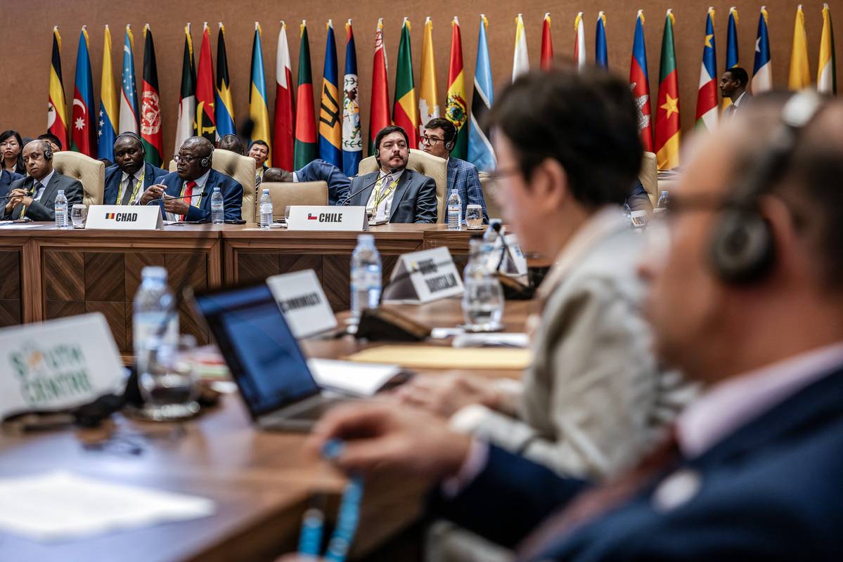 Delegates and Government representatives attend the closing session of the 19th Summit of Heads of State and Government of the Non-Aligned Movement (NAM) in Kampala on January 20, 2024. [Photo by LUIS TATO/AFP via Getty Images]