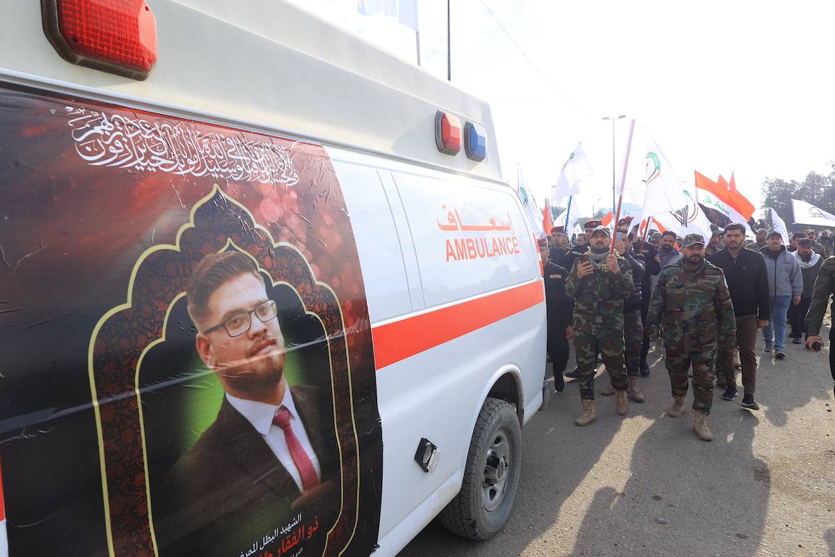 The funeral ceremony of Popular Mobilization Forces (PMF, Hashd al-Shaabi) militia who were killed in the US air strike on the Al-Qaim district of the Al-Anbar province, is held on February 04, 2024 in Baghdad, Iraq. [Murtadha Al-Sudani - Anadolu Agency]