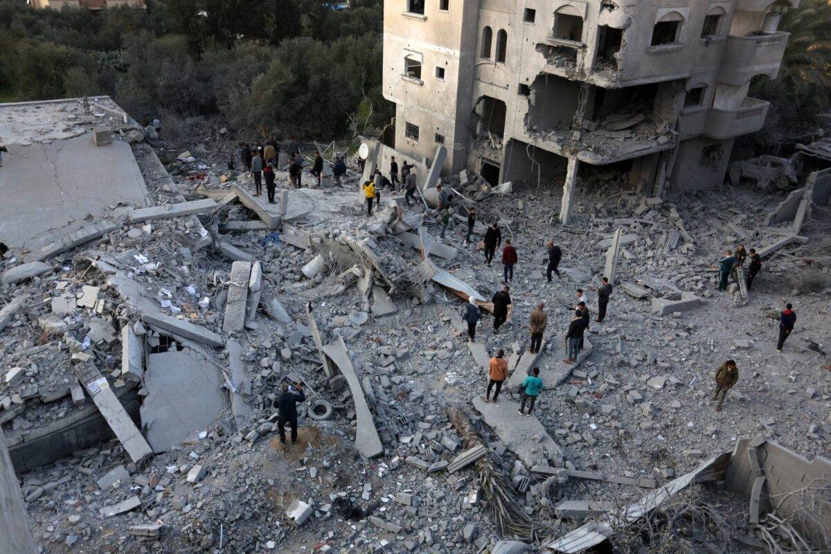 A view of destroyed buildings after Israeli attacks at al-Nuseirat refugee camp in Deir al-Balah, Gaza on February 14, 2024 [Ashraf Amra/Anadolu Agency]