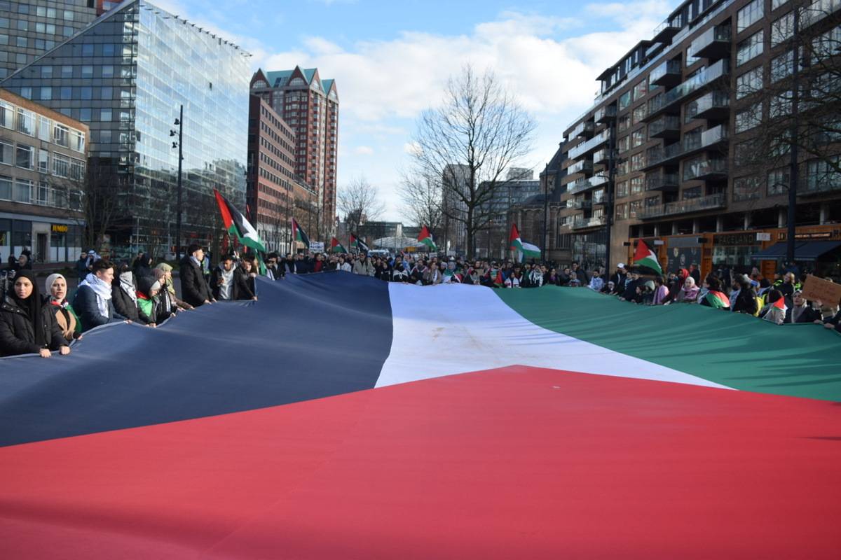 People in the Hands off Rafah manifestation participate in a protest procession through the city center of Rotterdam, Netherlands against Israel's actions in Gaza, on February 25, 2024. [Mouneb Taim - Anadolu Agency]