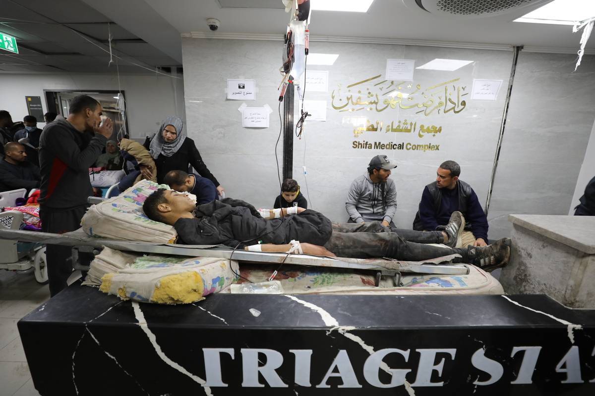 Injured Palestinians receive medical treatment in Al-Shifa Hospital after Israeli forces open fire on Palestinians waiting for humanitarian aid trucks at Al-Rashid Street in Gaza City, Gaza on February 29, 2024. [Dawoud Abo Alkas - Anadolu Agency]