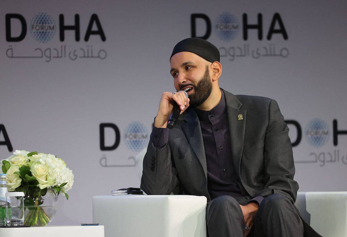 Founder and President of the Yaqeen Institute for Islamic Research Omar Suleiman takes part in a debate at the Doha Forum in Qatar's capital on March 27, 2022. [KARIM JAAFAR/AFP via Getty Images]