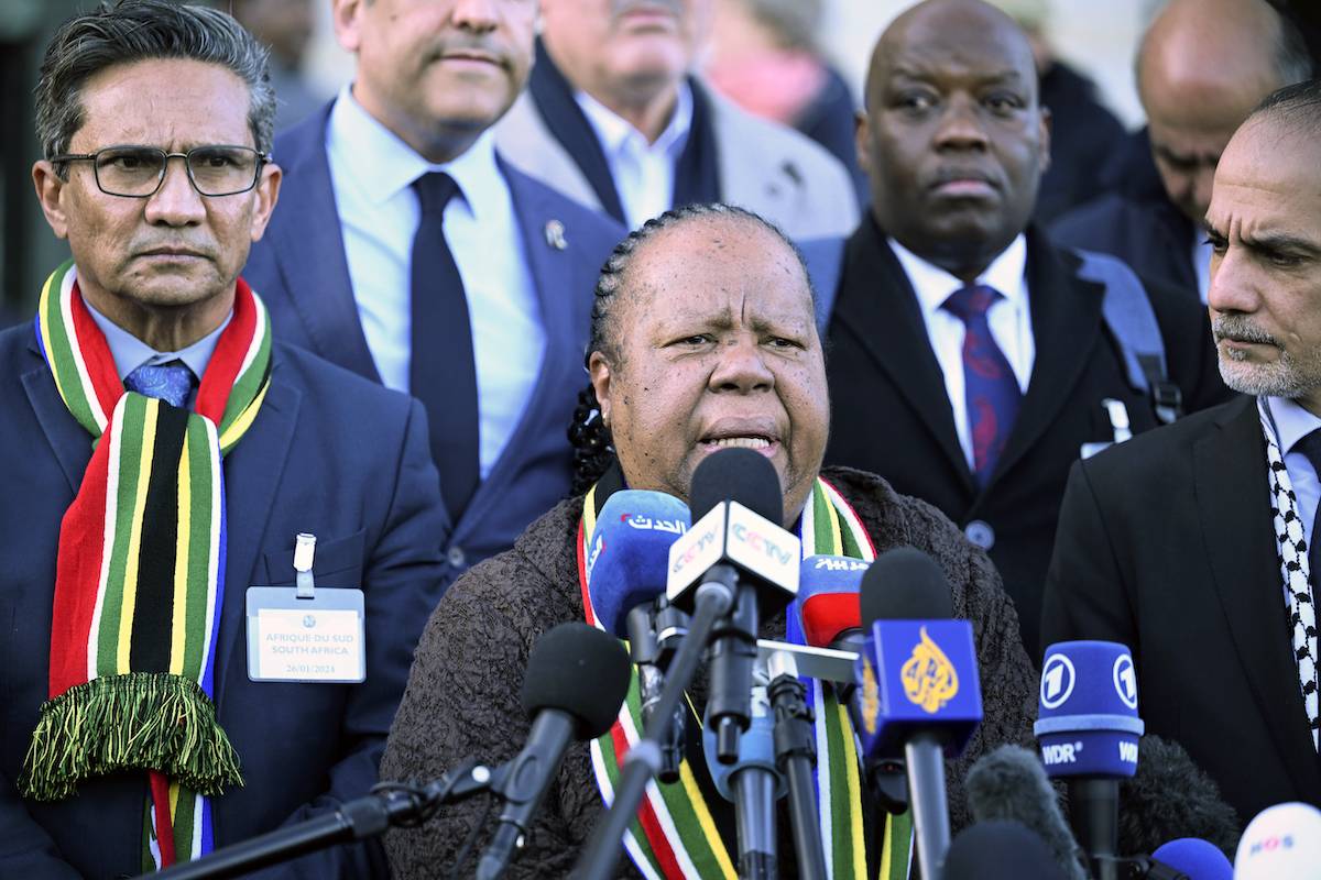 South Africa's Minister of International Relations and Cooperation Naledi Pandor (C) speaks to press members following the International Court of Justice (ICJ) ruling for Gaza in Lahey, Netherlands on January 26, 2024. [Dursun Aydemir/Anadolu via Getty Images]