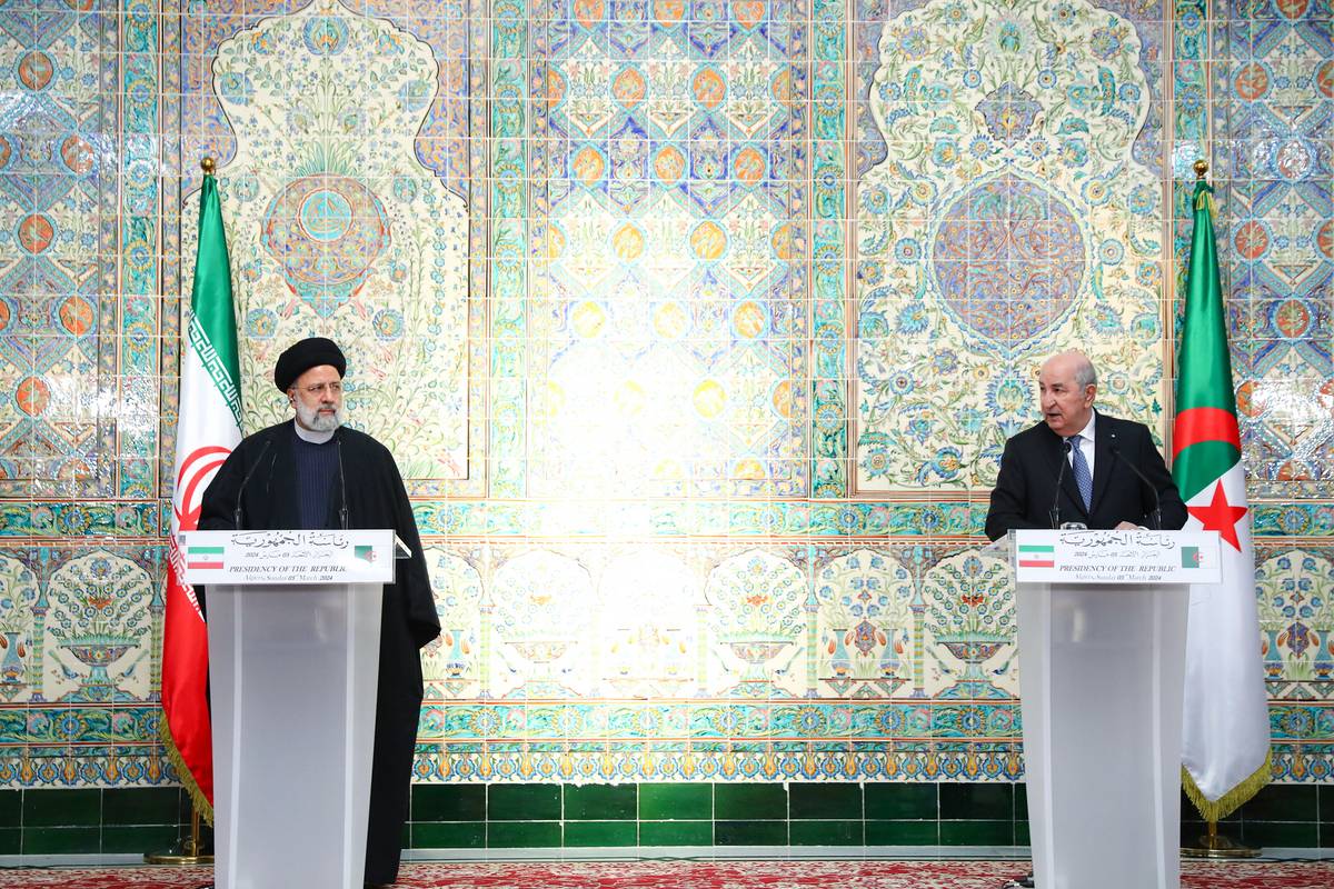 Iranian President Ebrahim Raisi (L) and Algerian President Abdelmadjid Tebboune (R) sign five cooperation agreements between two countries in the fields of energy, media, sports, tourism and oil and gas after an official meeting in the capital Algiers, Algeria on March 3, 2024. [Iranian Presidency / Handout - Anadolu Agency]