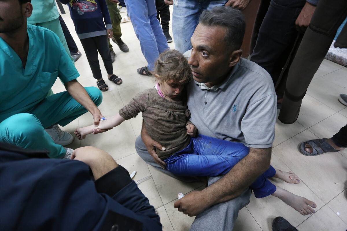 Injured Palestinians, including children, are brought to Al-Aqsa Martyrs Hospital for treatment following the Israeli attacks on the house belonging to the Selman family in Deir Al Balah, Gaza on March 05, 2024. [Ashraf Amra - Anadolu Agency]