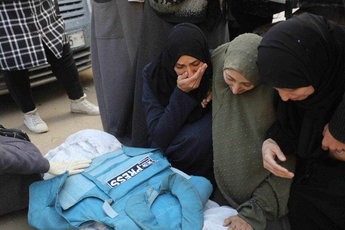 Relatives, loved ones and colleagues of Al-Aqsa TV anchor and journalist Mohammed Salamah, who was killed in an Israeli army attack on a house, attend his funeral ceremony held in front of Al-Aqsa Martyrs Hospital in Deir Al Balah of Gaza on March 06, 2024 [Ashraf Amra - Anadolu Agency]