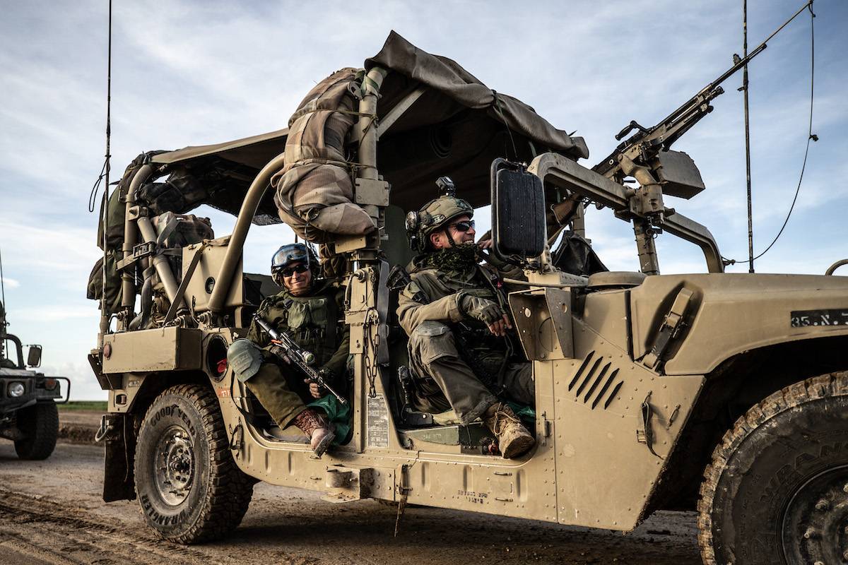 Israeli army with large number of tanks, armored personnel carriers, military bulldozers and helicopters continue to attack from air and ground in Khan Yunis, Gaza on March 7, 2024. [Mostafa Alkharouf - Anadolu Agency]