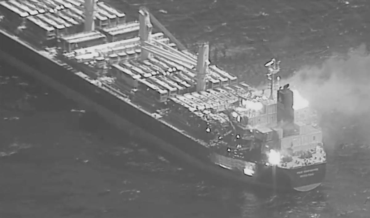 A view of a cargo vessel hit with anti-ship ballistic missile (ASBM) launched from Houthi-controlled areas of Yemen toward M/V True Confidence, a Barbados-flagged, Liberian-owned bulk carrier, while transiting the Gulf of Aden on March 6, 2024. [CENTCOM - Anadolu Agency]