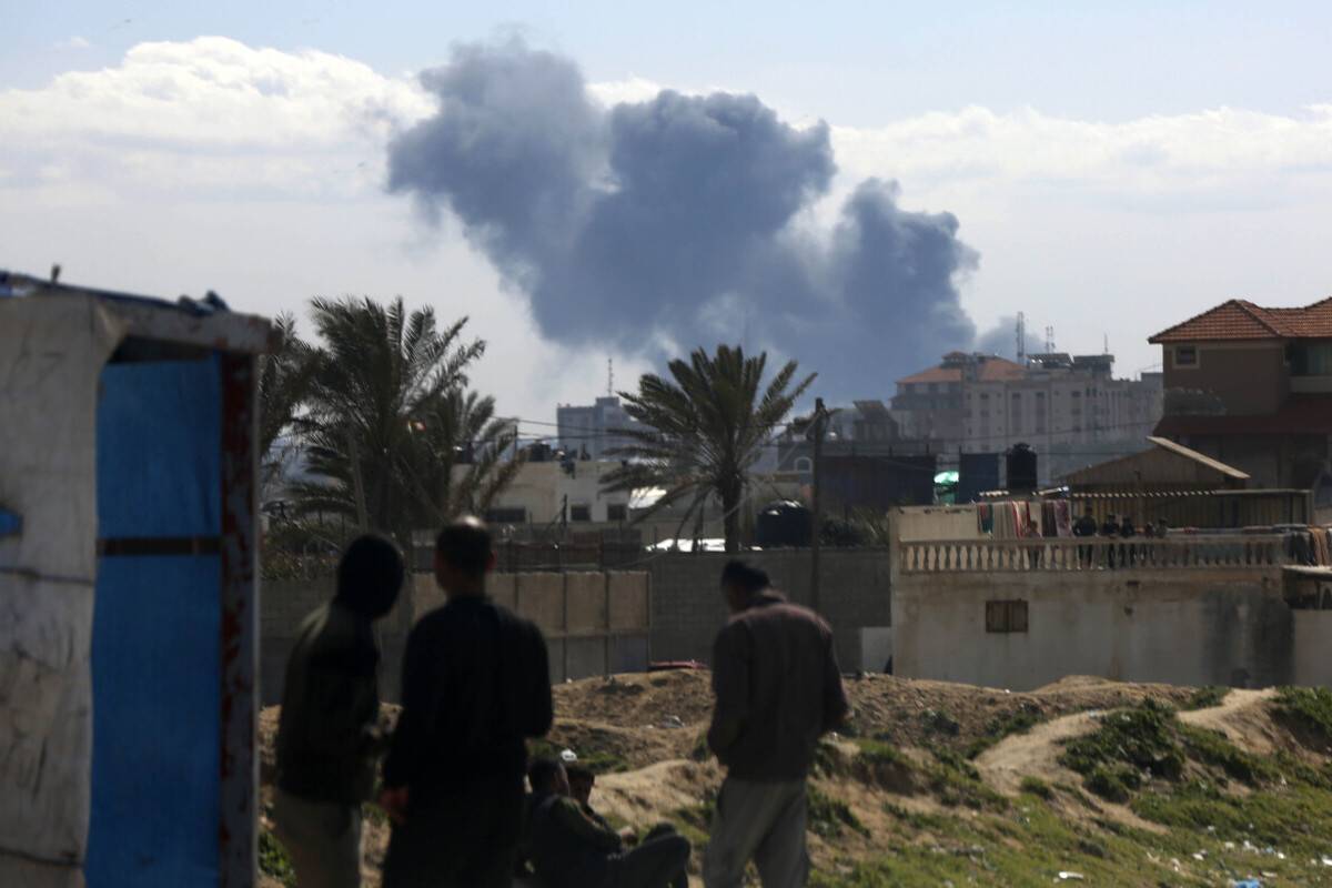 Smoke rises over the residential area following the Israeli attacks in Khan Yunis, Gaza on March 09, 2024. [Ashraf Amra - Anadolu Agency]