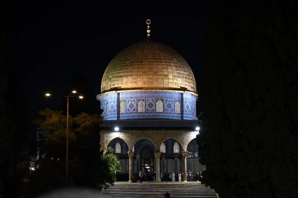 Muslims perform tarawih prayer on the first Friday night of the Holy month of Ramadan at Masjid al-Aqsa Compound in Jerusalem on March 10, 2023. [Mostafa Alkharouf - Anadolu Agency]