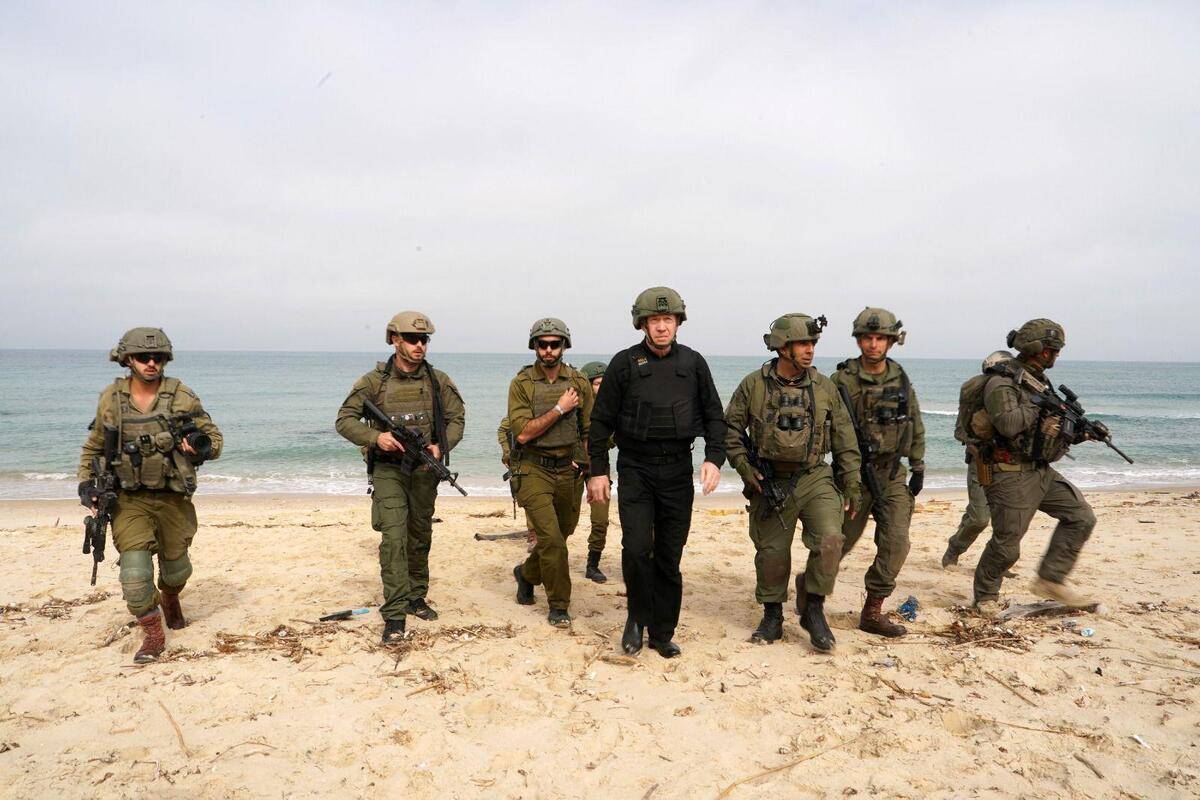 Israeli Defence Minister Yoav Gallant (L) visit the troops participating in Gaza Strip and made a situation assessment with the commanders in Rafah, Gaza on March 13, 2024. [Ariel Hermoni (GPO) / Handout - Anadolu Agency]