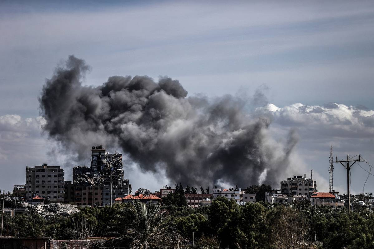 Smoke rises over the residential area as a result of the Israeli attack on the Al-Zahra in Gaza City, Gaza on March 15, 2024. [Ali Jadallah - Anadolu Agency]