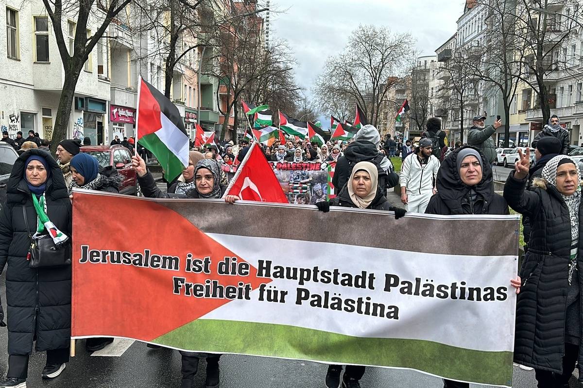 People, holding banners and Palestinian flags, gather to stage a demonstration in support of Palestinians, and to protest against Israeli attacks over Gaza, near Sonnenallee train station in Neukolln district of Berlin, Germany on March 16, 2024. [Erbil Başay - Anadolu Agency]