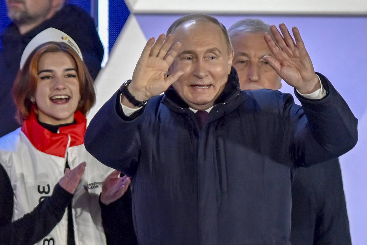 Russian President Vladimir Putin greets his citizens gathered at Red Square in Moscow, Russia on March 18, 2024. [Sefa Karacan - Anadolu Agency