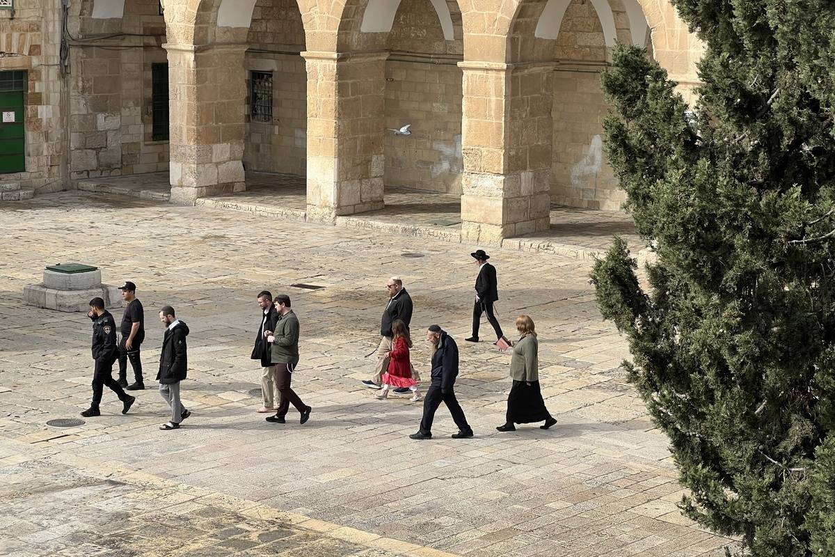 Dozens of fanatical Jewish groups, accompanied by Israeli police, storm the courtyard of Al-Aqsa Mosque within the Purim celebrations in Old City of Eastern Jerusalem on March 24, 2024. [Mohammad Hamad - Anadolu Agency]