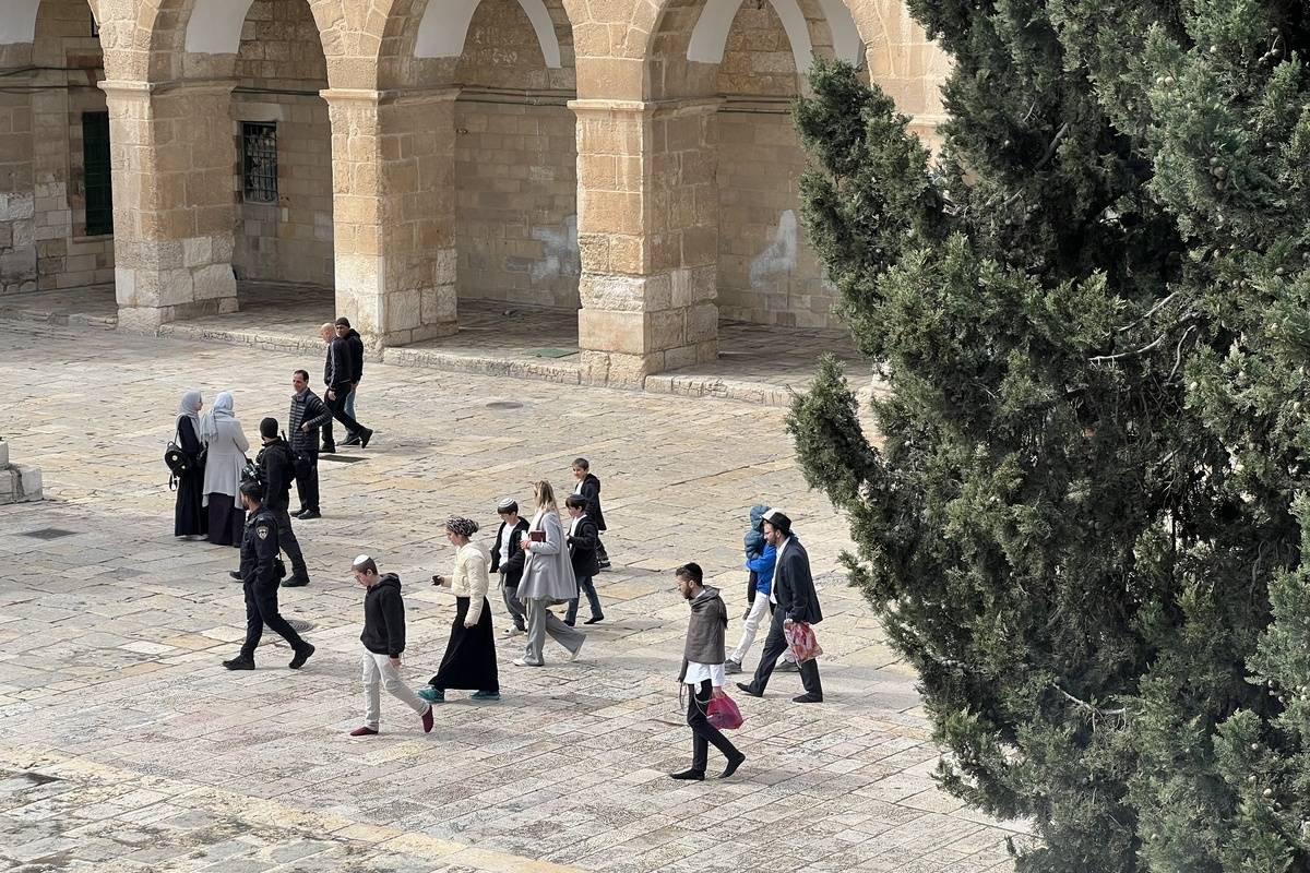 Dozens of fanatical Jewish groups, accompanied by Israeli police, storm the courtyard of Al-Aqsa Mosque within the Purim celebrations in Old City of Eastern Jerusalem on March 24, 2024. [Mohammad Hamad - Anadolu Agency]