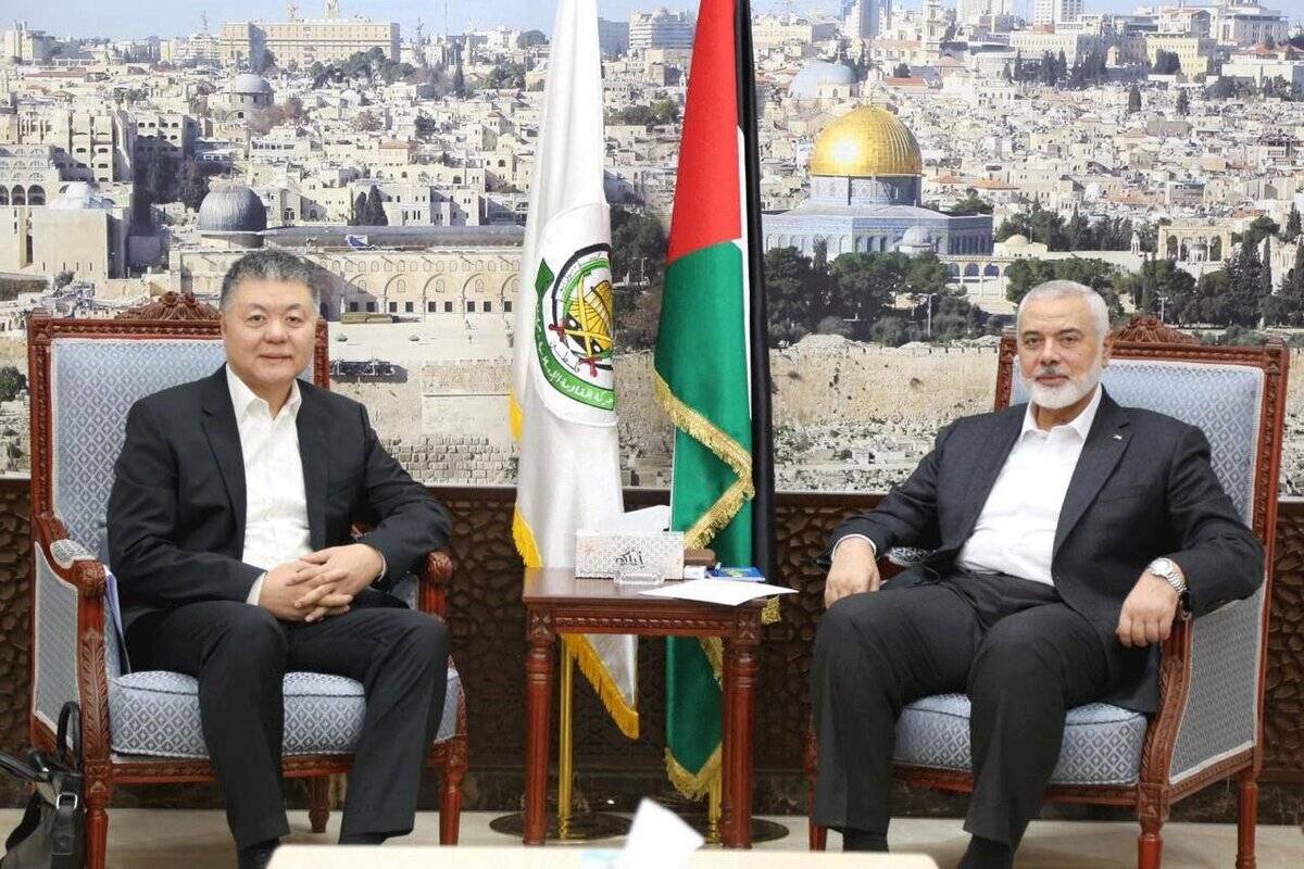Chinese envoy Wang Kejian (L) met with Hamas political chief Ismail Haniyeh (R) in Qatar on March 17, 2024. [@soupalestina/X/Twitter]