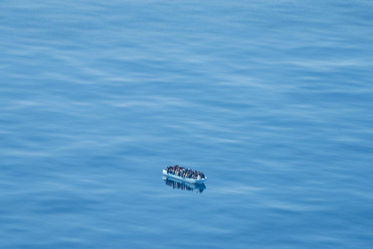 The lives of an estimated 100 migrants whose boat engine had failed were put at risk after Libya coastguards carried out 'dangerous manoeuvres' near their boat in international waters on 16 March 2024. [@seawatch_intl/X/Twitter]