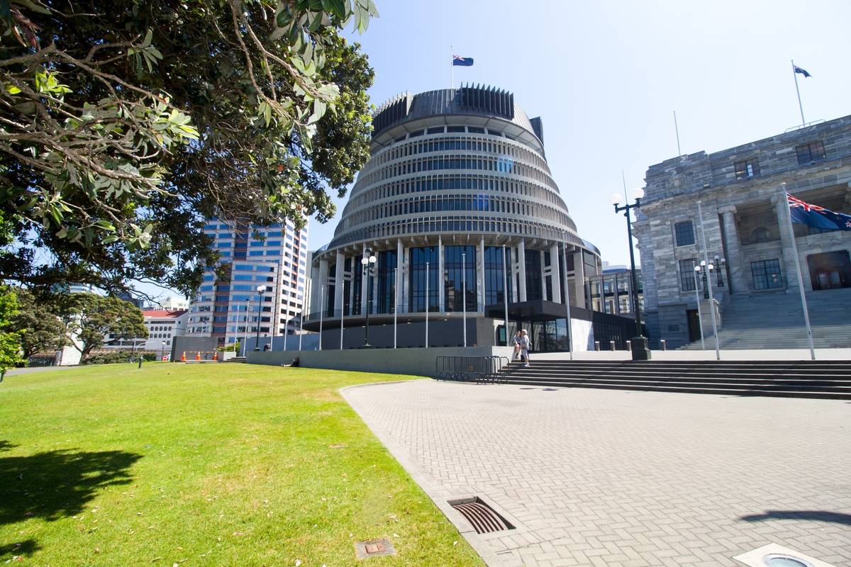 "Beehive" building at the New Zealand Parliament on Lambton Quay in downtown Wellington, New Zealand. [Photo by Smith Collection/Gado/Getty Images]