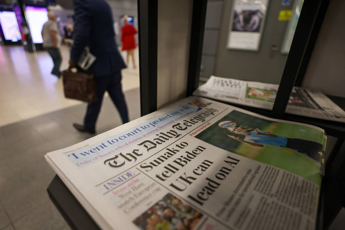 Copies of The Daily Telegraph newspaper on a newsstand in a shop in London, UK, on Thursday, June 8, 2023. [Photo by Hollie Adams/Bloomberg via Getty Images]