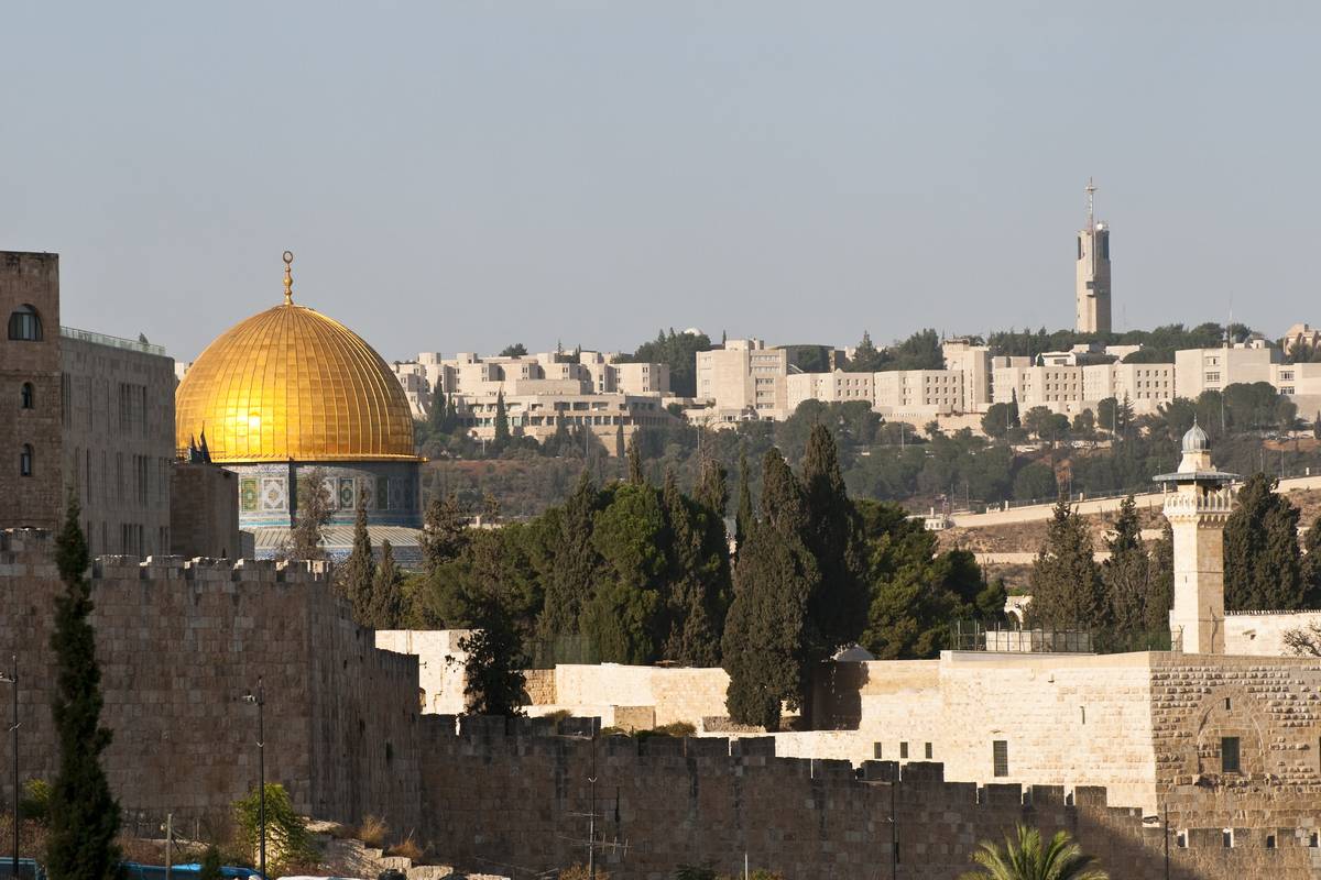 View from the Mount Zion area of Jerusalem toward Hebrew University on Mount Scopus (it is the hill in the distance and includes the tower). In the foreground on the left is the Dome of the Rock. [stock photo via Getty Images]