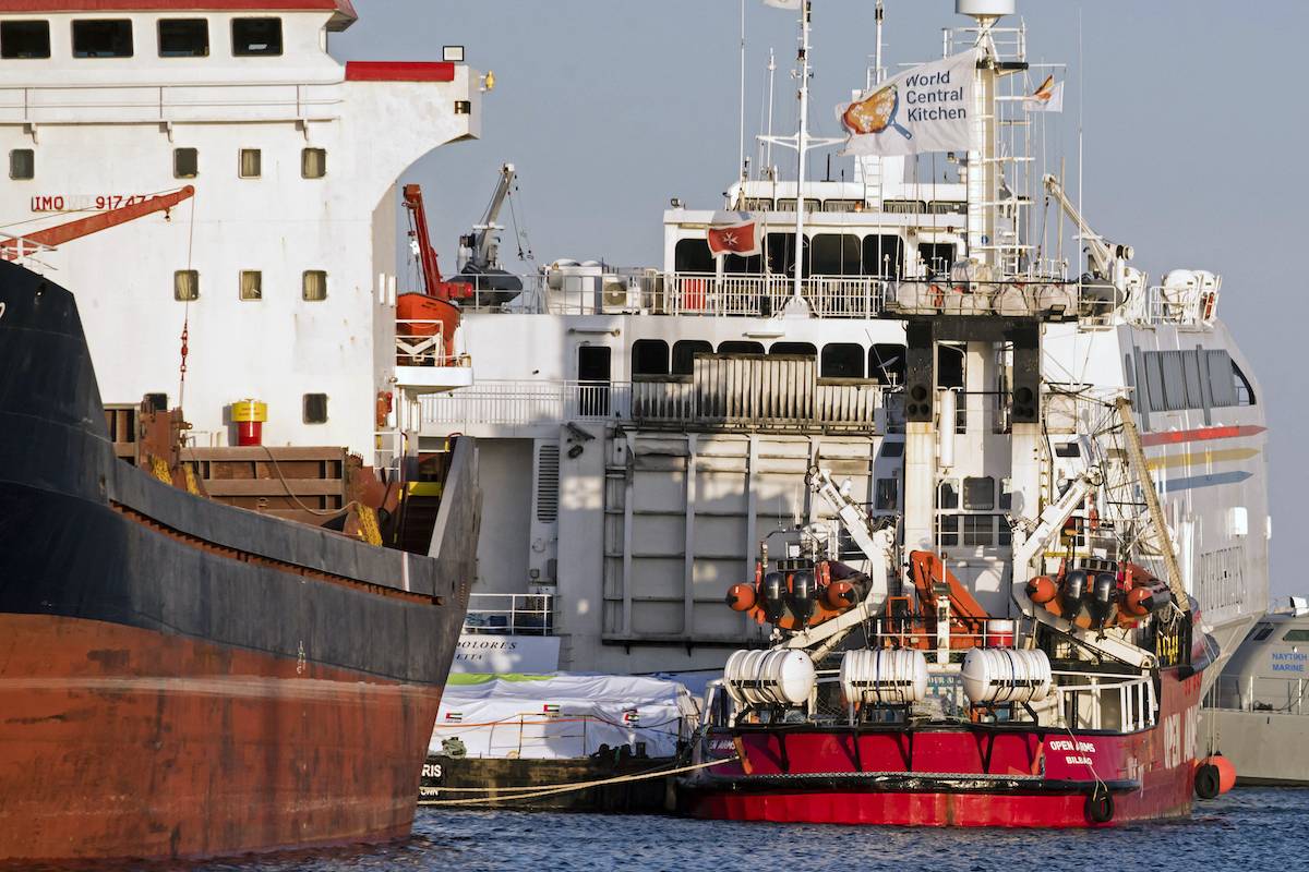 The Open Arms vessel (C) is pictured in the Cypriot port of Larnaca on March 11, 2024. A Cyprus government spokesman said a Spanish charity ship with food aid was set to sail from the island within hours to the coastal Gaza Strip, where the UN has repeatedly warned of famine. [IAKOVOS HATZISTAVROU/AFP via Getty Images]