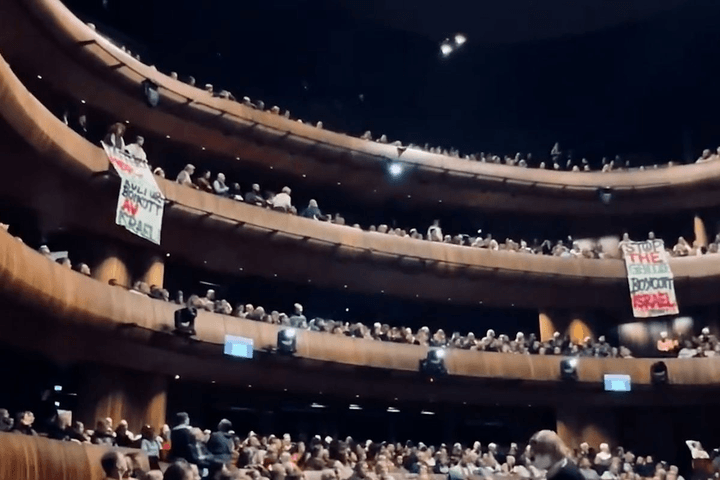 Protesters raise banner for Gaza at Opera House in Norway