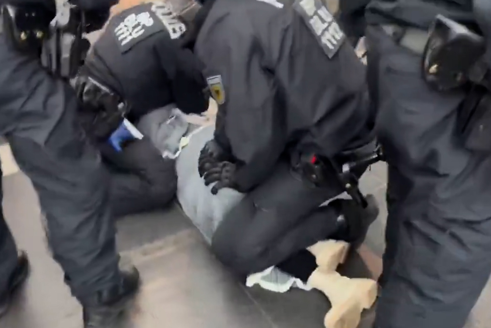 German police assault Hijab-wearing woman amid crackdown on pro-Palestinian demonstrators
