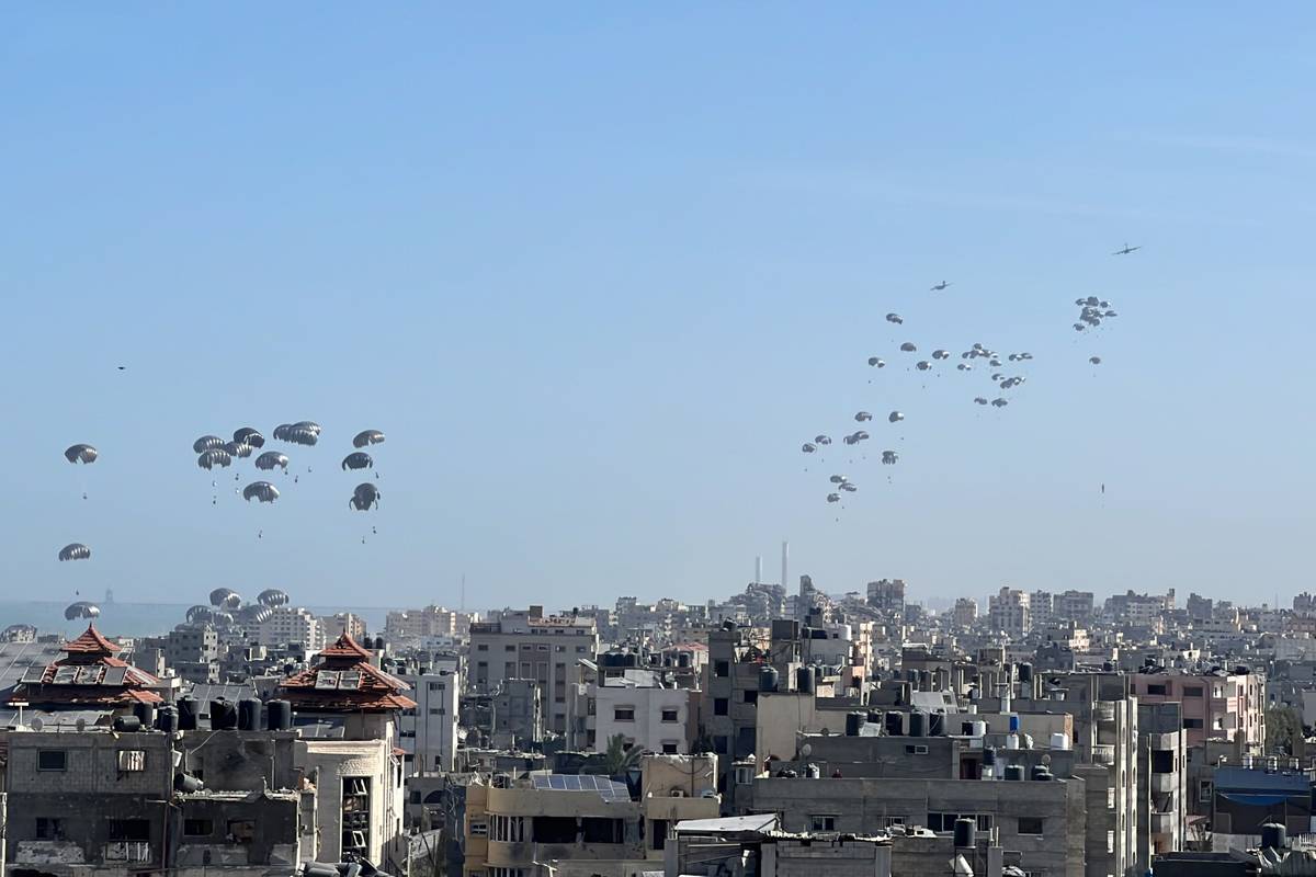 A view of humanitarian aid boxes dropped from a plane on the western Gaza Strip as the Israeli attacks continue at the Gaza Strip on April 1, 2024. [Ramzi Mahmud - Anadolu Agency]