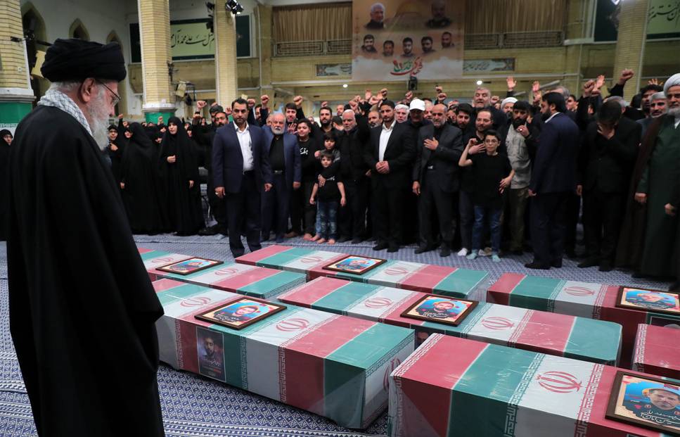 Iranian Supreme Leader Ayatollah Ali Khamenei and relatives of the victims attends the funeral ceremony held for victims who lost their lives in Israeli attack on Iran's consulate building in the embassy compound in Damascus in Tehran, Iran on April 04, 2022. [Iranian Leader Press Office/Handout - Anadolu Agency]