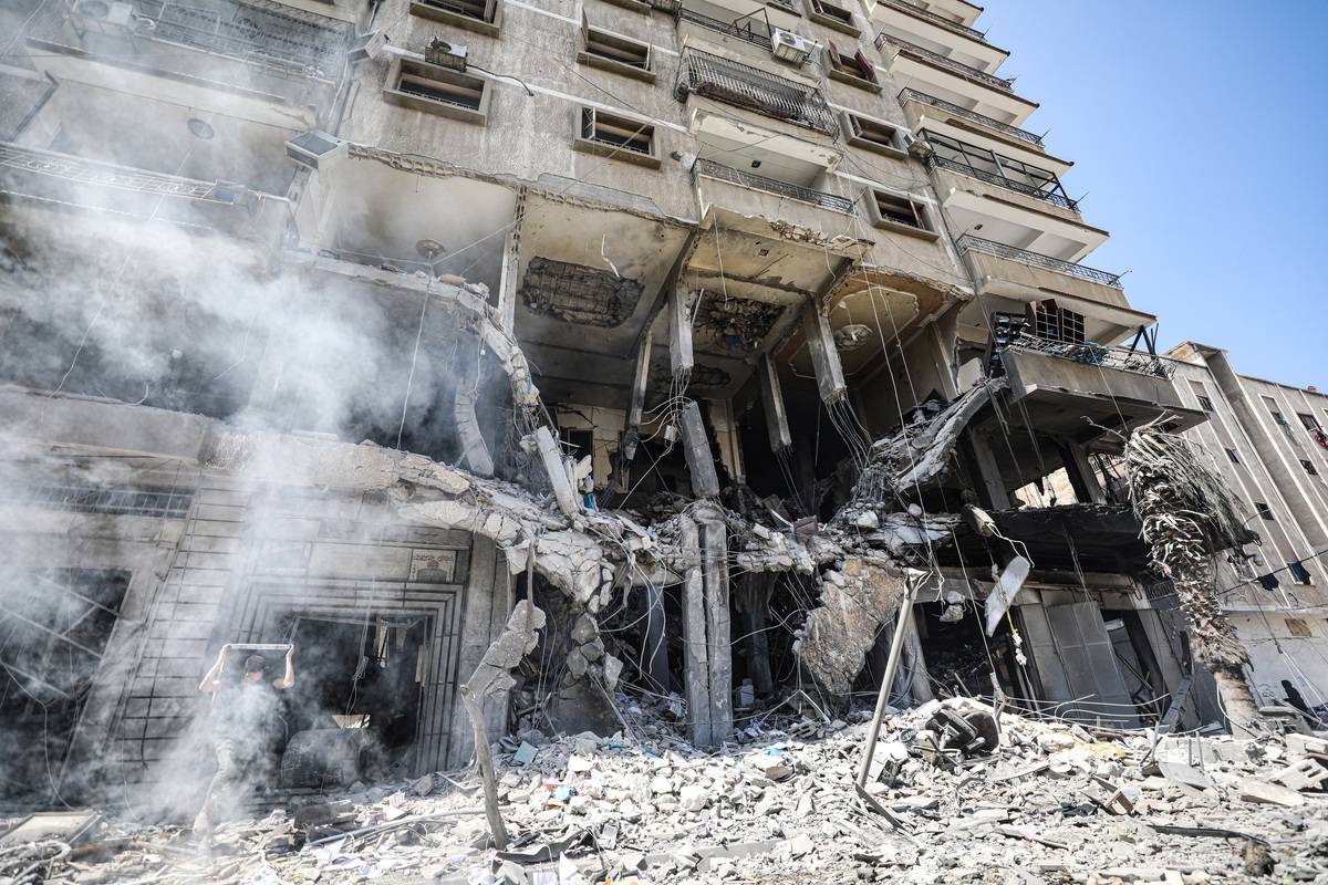 A view of a destroyed building after an Israeli attack that killed Palestinians including children as the mosques and vehicles are demolished in Gaza City, Gaza on April 13, 2024. [Dawoud Abo Alkas - Anadolu Agency]