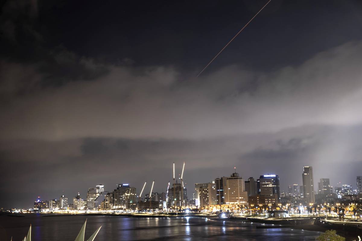 Explosions are seen in the skies of the capital, following the attack from Iran in Tel Aviv, Israel on April 14, 2024. [Mostafa Alkharouf - Anadolu Agency]