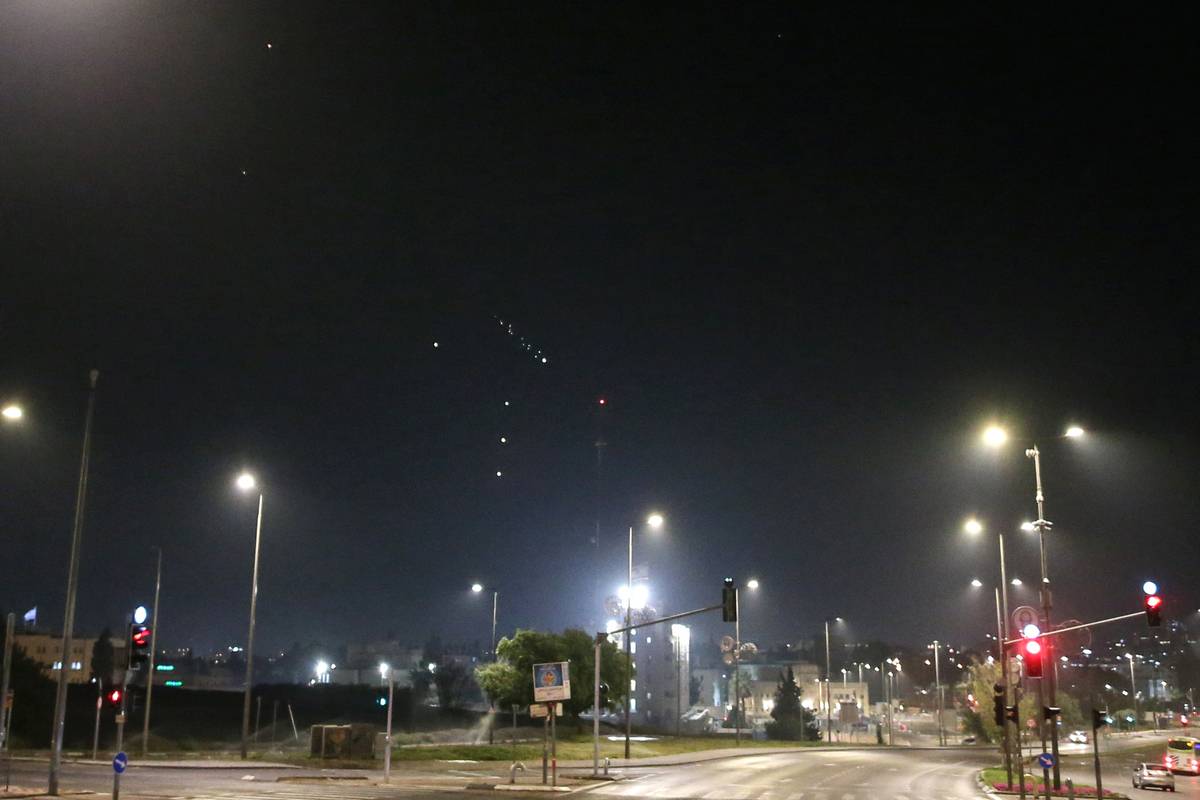 Explosions are seen in the skies of Jerusalem, following the attack from Iran on April 14, 2024. [Saeed Qaq - Anadolu Agency]