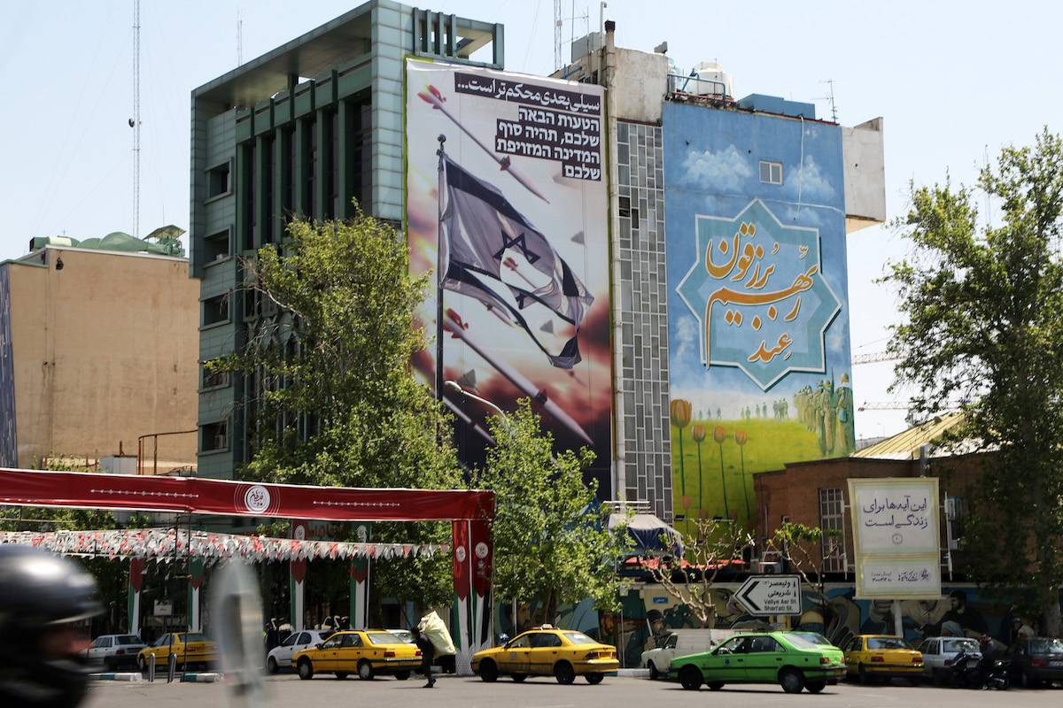 A view of anti-Israel banners and posters placed on building walls in the capital city of Tehran after Iran launched drones, missiles on Israel in response to April 1 attack on consulate in Syria on April 14, 2024. [Fatemeh Bahrami - Anadolu Agency]