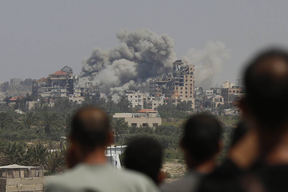 Smoke billows after Israeli army launched an airstrike on Al Mughraqa area in Gaza Strip, on April 14, 2024. [Ashraf Amra - Anadolu Agency]
