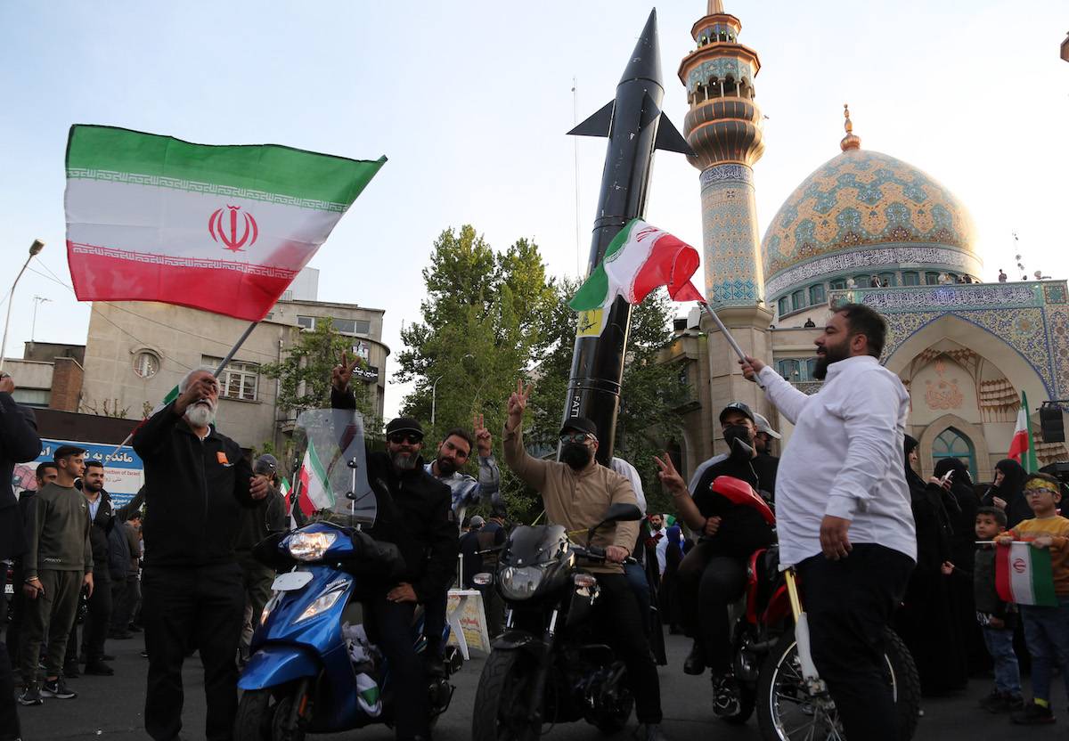 A group gather in Palestine Square in the Iranian capital Tehran, staging a demonstration to support Iran's drone and missile attacks on Israel on April 15, 2024. [Fatemeh Bahrami - Anadolu Agency]
