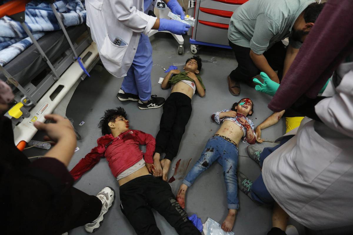 Injured and killed Palestinian children are brought to the al-Aqsa Martyrs Hospital following the Israeli attacks on Maghazi refugee camp area in Deir al-Balah, Gaza on April 16, 2024. [Ashraf Amra - Anadolu Agency]
