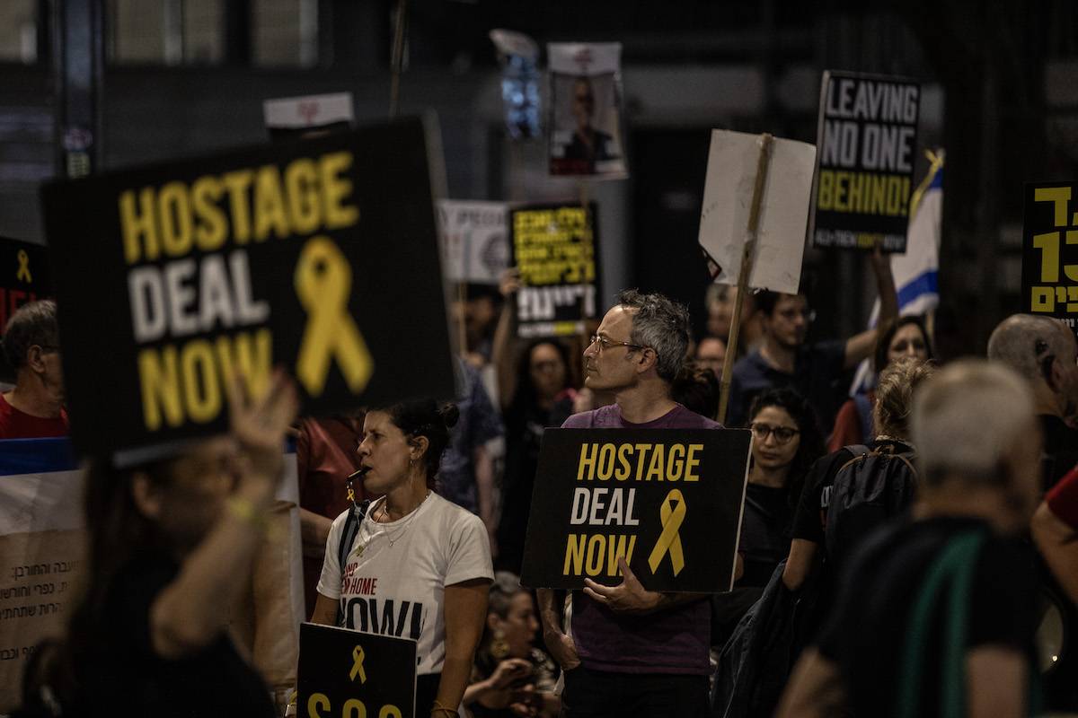 Relatives of hostages, held by Hamas, gather to stage a protest against the government of Prime Minister Binyamin Netanyahu and demanding an end to the war and immediate return of them to their homes, in front of the Defense Ministry building in Tel Aviv, Israel on April 23, 2024. [Mostafa Alkharouf - Anadolu Agency]