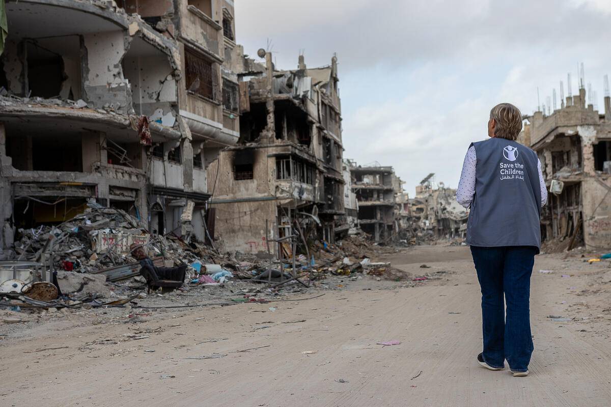 Karyn Beattie, Gaza Team Leader, Save the Children, assesses the destruction in Khan Yunis, on 21 April 2024 [Save the Children]