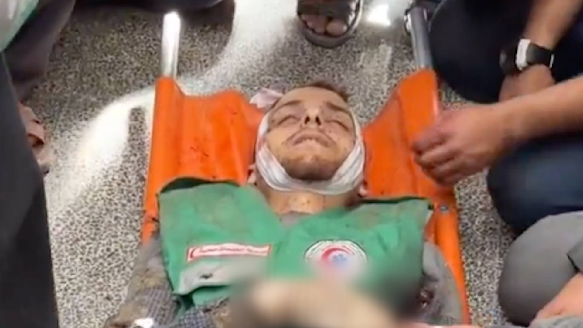 Friends of paramedic mourn him after he was killed in an Israeli airstrike in Gaza