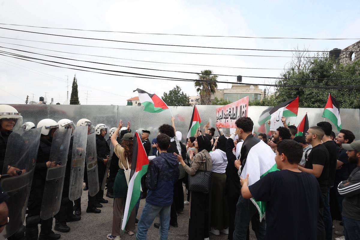 Birzeit University students gathered in front of the Canadian embassy building to protest the Canadian government's support for Israel, demonstrating solidarity with Palestine near the Canadian consulate in the city of Ramallah, West Bank on April 30, 2023. [Issam Rimawi - Anadolu Agency]