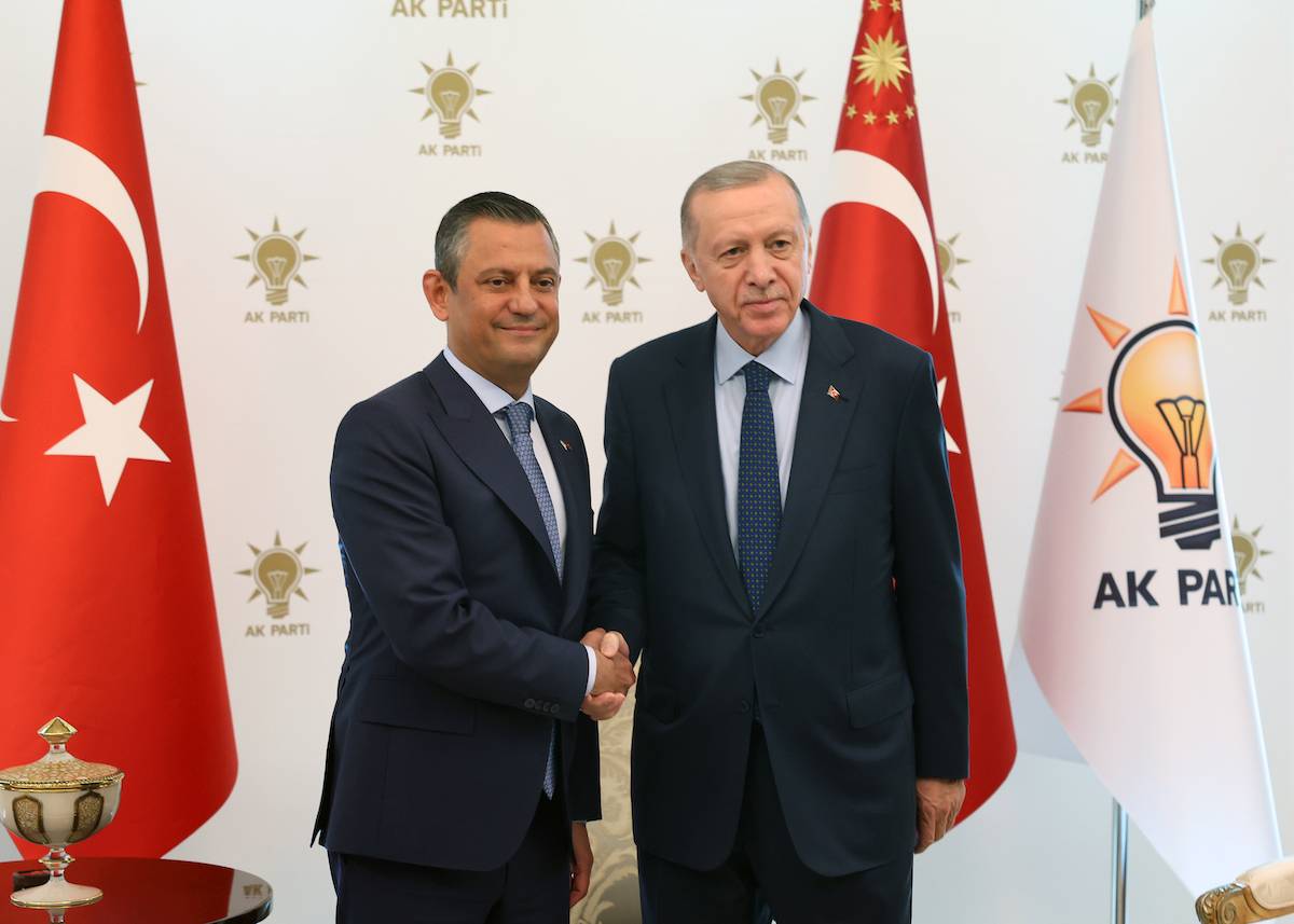 Turkish President Recep Tayyip Erdogan (R) meets with CHP Chairman Ozgur Ozel (L) at AK Party Headquarters in Ankara, Turkiye on May 2, 2024. [TUR Presidency/ Mustafa Kamaci - Anadolu Agency]